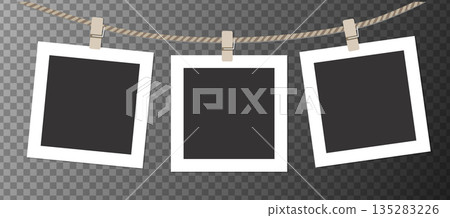 Realistic retro set photo frames hanging on rope. 135283226