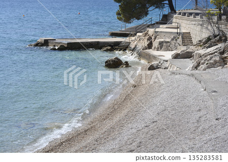 Coastal Pebble Beach in Front of Emil Antica Street in Selce Coastal Pebble Beach in Front of Emil Antica Street in Selce 135283581