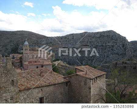 The city and mountains surrounding Albarracín Cathedral The city and mountains surrounding Albarracín Cathedral 135283898