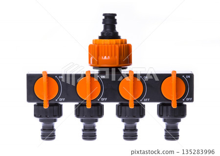 Plastic 4-channel distributor to supply water on a white background 135283996