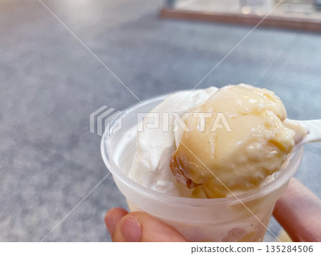 Pudding topped with soft serve ice cream 135284506