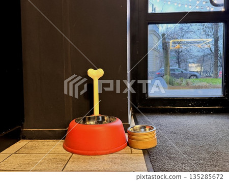 Christmas tree decorated with red bows 135285672