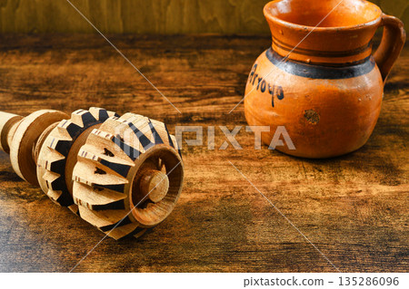 Mexican molinillo cooking utensils for making chocolate 135286096