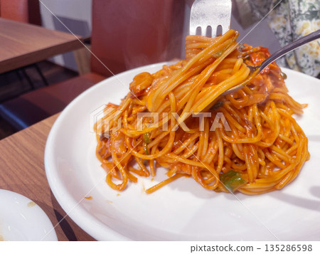 Spaghetti Napolitan: A nostalgic ketchup-flavored pasta from old-fashioned coffee shops. Spaghetti Napolitan: A nostalgic ketchup-flavored pasta from old-fashioned coffee shops. 135286598