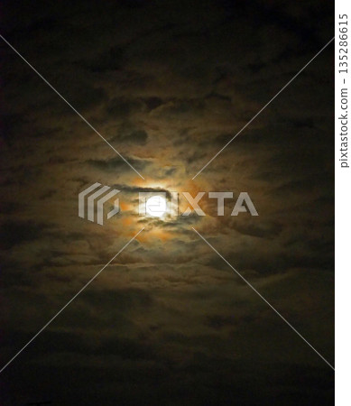The moon is hidden by dark clouds 135286615