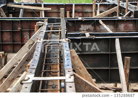 Reinforced Concrete Foundation Formwork with Steel Rebar Grid at Active Construction Site 135288687