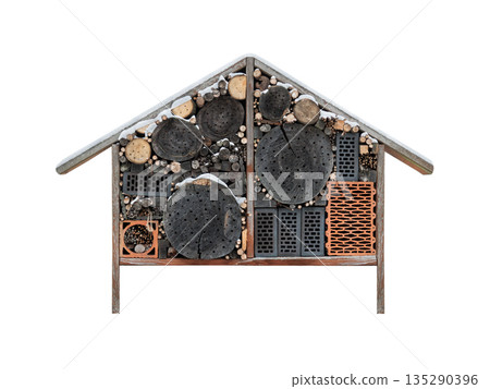 insect house covered with snow isolated on white background insect house covered with snow isolated on white background 135290396
