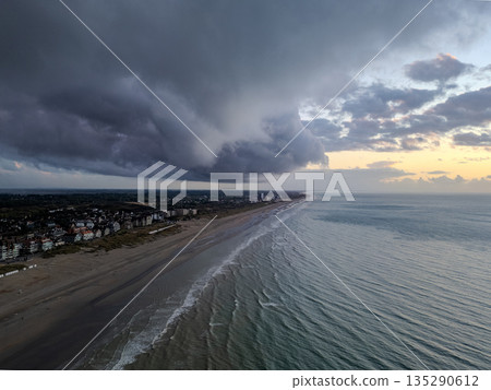 Nieuwpoort, West-Vlaanderen, Belgium, September 13th, 2025, A Colorful Coastal Sunset is Beautifully 135290612