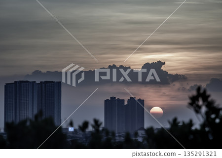 Natural Sunset in evening downtown silhouette at bangkok. Natural Sunset in evening downtown silhouette at bangkok. 135291321