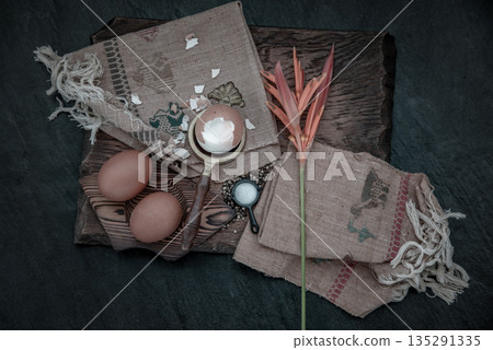 Boiled eggs with salt and pepper on beautiful wooden background, Nutrition concept. Boiled eggs with salt and pepper on beautiful wooden background, Nutrition concept. 135291335