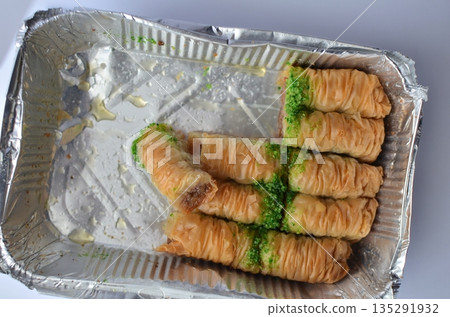 Baklava Rolls in Aluminum Tray: A Sweet Taste of Middle Eastern Delight 135291932
