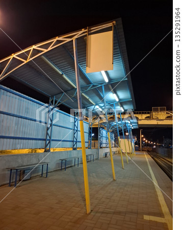 An empty tram stop in the evening time An empty tram stop in the evening time 135291964