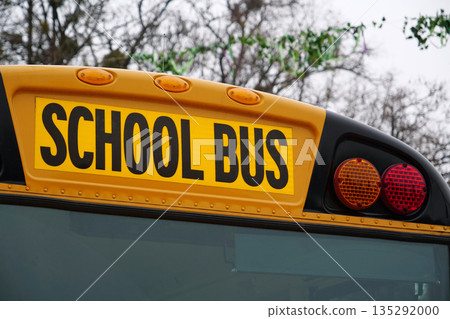 Yellow school bus on the street Yellow school bus on the street 135292000