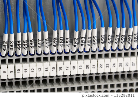Terminal blocks in electrical cabinet.Industrial electrical equipment and wiring Terminal blocks in electrical cabinet.Industrial electrical equipment and wiring 135292011