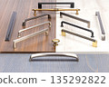 Diverse collection of cabinet handles showcasing elegant designs for home improvement projects 135292822