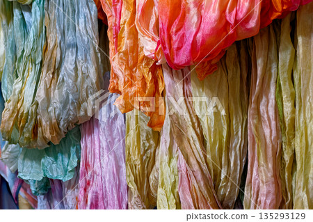 Silk scarves, shawls and neckerchiefs in various colors 135293129