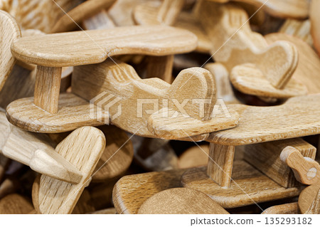 A lot of small toy wooden airplanes A lot of small toy wooden airplanes 135293182
