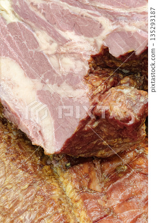 Smoked pork belly or brisket on the counter of a butcher shop 135293187