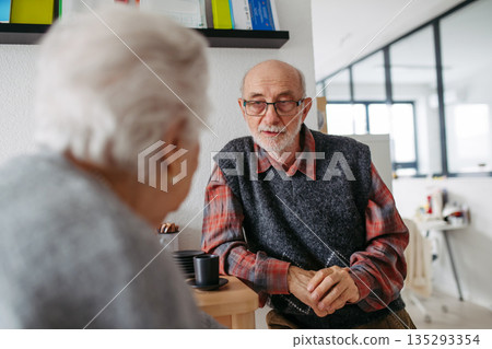 Seniors in love in community or retirement center. 135293354