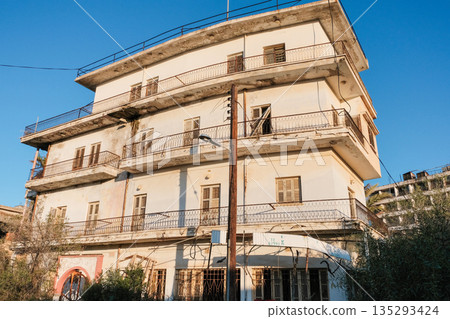 VAROSHA, CYPRUS: December 26, 2025. Abandoned buildings and decaying hotels in the ghost town district of Famagusta, North Cyprus. Kapali Maras. VAROSHA, CYPRUS: December 26, 2025. Abandoned buildings and decaying hotels in the ghost town district of Famagusta, North Cyprus. Kapali Maras. 135293424