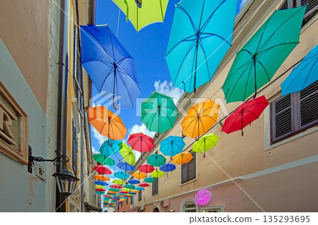 Colorful umbrellas over street in Novigrad old town 135293695