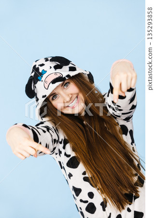 Woman wearing pajamas cartoon pointing down Woman wearing pajamas cartoon pointing down 135293858