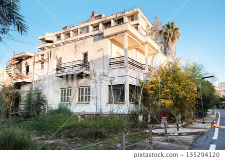 VAROSHA, CYPRUS: December 26, 2025. Abandoned buildings and decaying hotels in the ghost town district of Famagusta, North Cyprus. Kapali Maras. 135294120