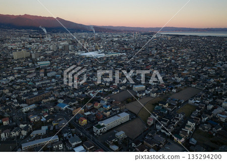 Aerial view of Fuji city and Suruga Bay at dusk Aerial view of Fuji city and Suruga Bay at dusk 135294200