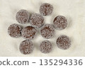 Sweet rum balls in sugar 135294336