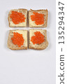 Trout caviar canapes on white background 135294347