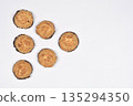 Coconut macaroons with chocolate on white background 135294350