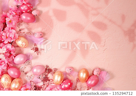 Beautiful Easter banner with decorated festive eggs, sakura and cherry blossom branches, spring butterflies and feathers. Happy Easter concept. Abstract spring Easter composition with space for text Beautiful Easter banner with decorated festive eggs, sakura and cherry blossom branches, spring butterflies and feathers. Happy Easter concept. Abstract spring Easter composition with space for text 135294712