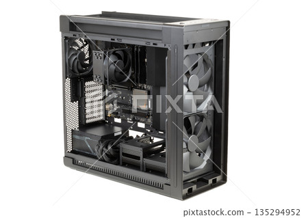 Side view  big tower, PC case, chassis,  inside motherboard, CPU, fan, SSD, memory, power supply unit with cables, isolated on white 135294952