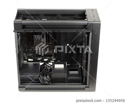 Side view big tower, PC case, chassis, inside motherboard, CPU, fan, SSD, memory, power supply unit with cables, isolated on white Side view big tower, PC case, chassis, inside motherboard, CPU, fan, SSD, memory, power supply unit with cables, isolated on white 135294956