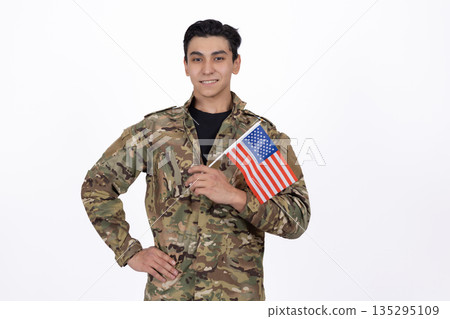 Military man in uniform with USA flag on background 135295109