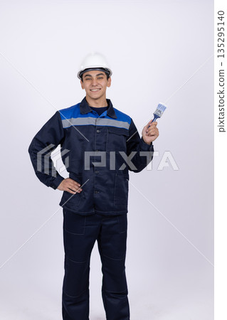 Service worker in uniform presenting blank card Service worker in uniform presenting blank card 135295140