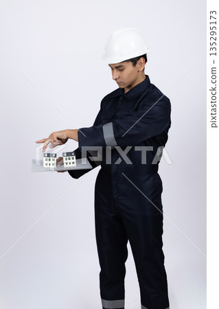 Professional worker in uniform looking at clipboard 135295173