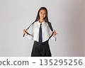 Girl student with backpack on white background 135295256