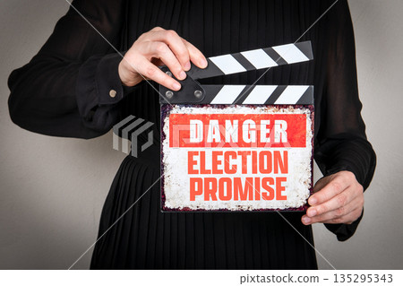 Political Warning Concept With Danger Election Promise Clapperboard Sign 135295343