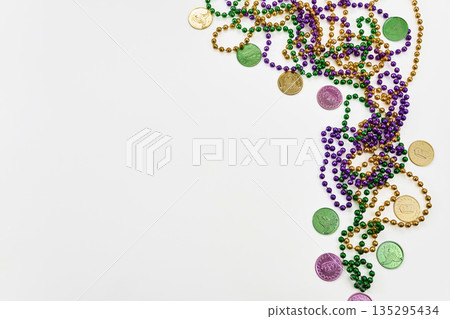 Mardi gras festival beads and doubloons border Mardi gras festival beads and doubloons border 135295434