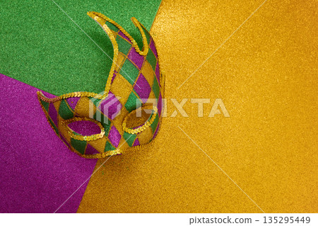 Mardi gras carnival mask on glitter background 135295449
