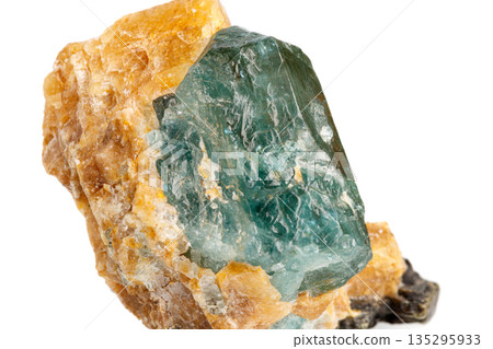 macro stone mineral apatite in calcite on a white background macro stone mineral apatite in calcite on a white background 135295933