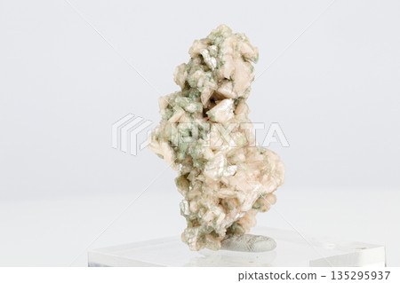 macro stone mineral stilbite on Apophyllite on a white background 135295937