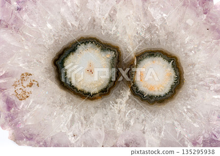 macro stone mineral eye amethyst on a white background 135295938