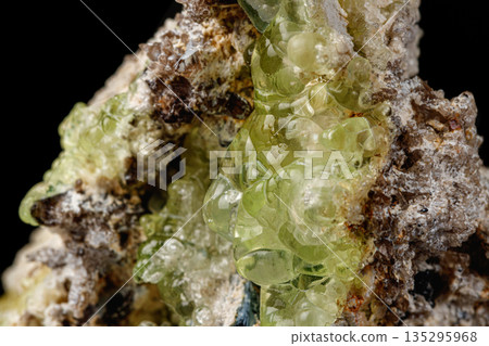 Macro stone Hyalite mineral, tourmaline Sherl, smoky quartz on a black background Macro stone Hyalite mineral, tourmaline Sherl, smoky quartz on a black background 135295968