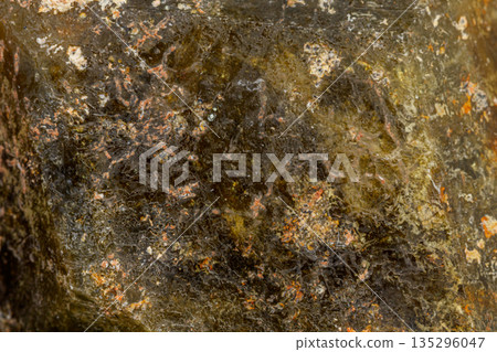 macro mineral stone Andradite on a black background macro mineral stone Andradite on a black background 135296047