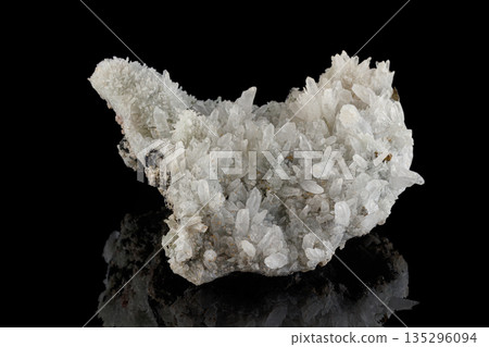 macro mineral stone Quartz Pyrite on a black background 135296094