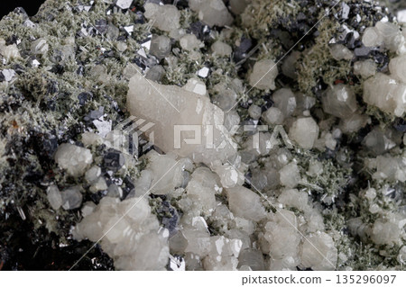 macro stone mineral Quartz Calcite Sphalerite Galena on a black background 135296097