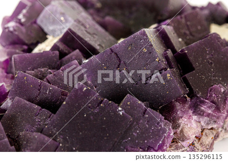 Macro stone mineral Fluorite on a white background Macro stone mineral Fluorite on a white background 135296115