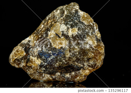 macro mineral stone Labradorite on a black background 135296117